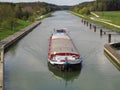 Cargo ship in canal of Rhine Main Danube in Germany Royalty Free Stock Photo